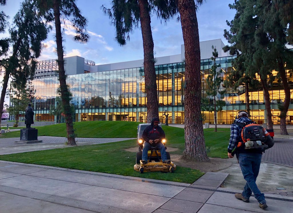 Groundskeeper on a riding mower